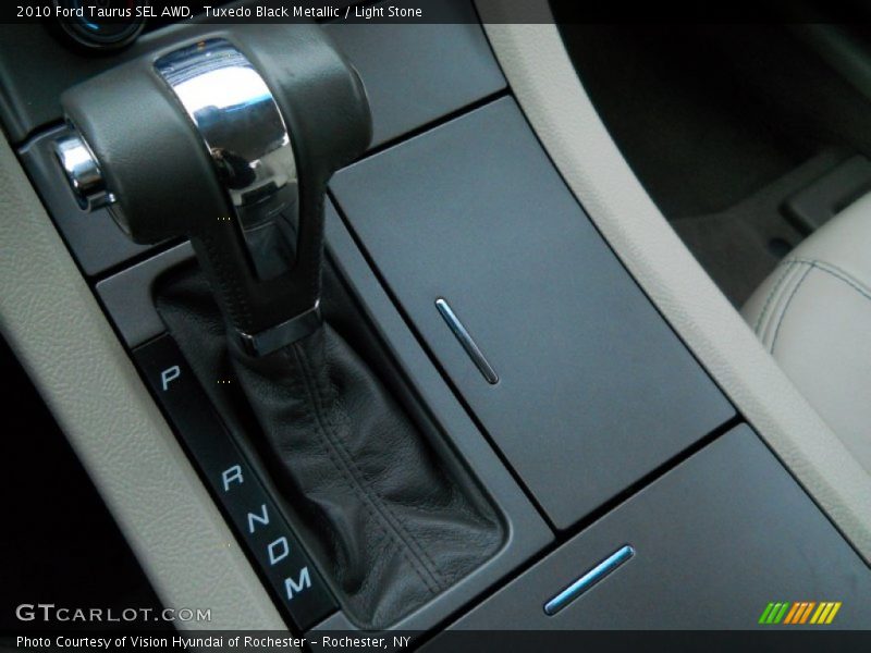 Tuxedo Black Metallic / Light Stone 2010 Ford Taurus SEL AWD