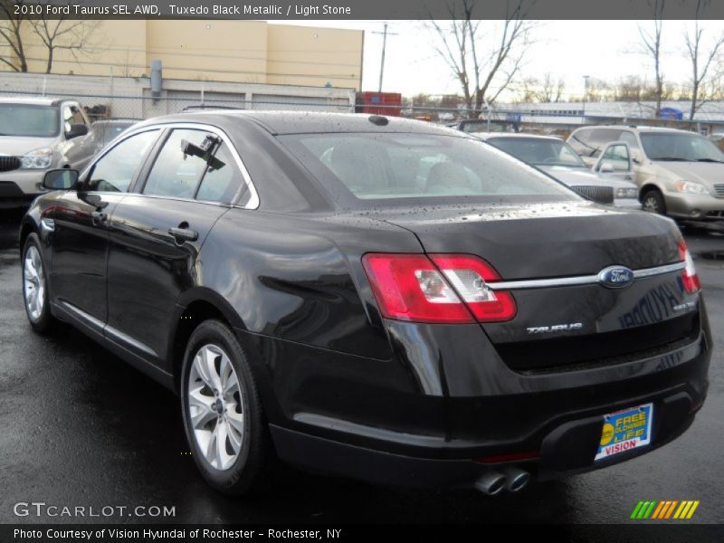 Tuxedo Black Metallic / Light Stone 2010 Ford Taurus SEL AWD