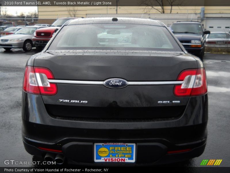 Tuxedo Black Metallic / Light Stone 2010 Ford Taurus SEL AWD