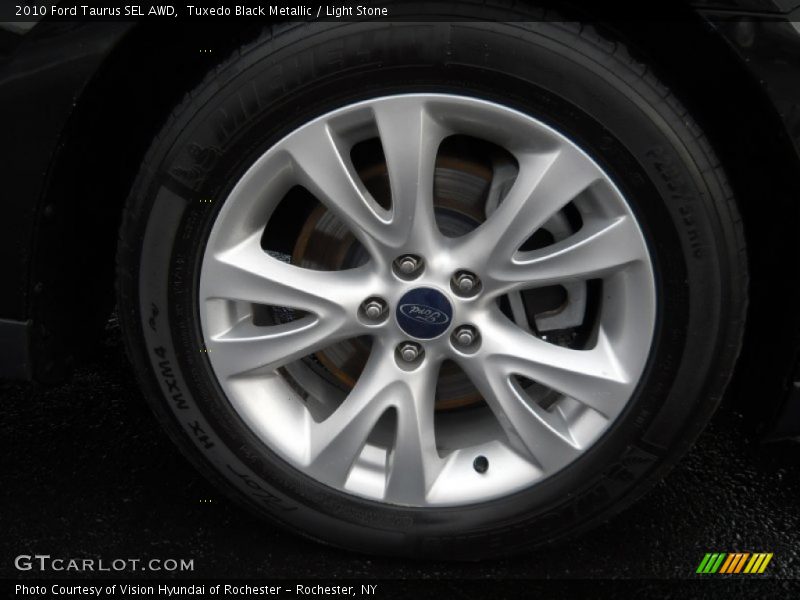 Tuxedo Black Metallic / Light Stone 2010 Ford Taurus SEL AWD