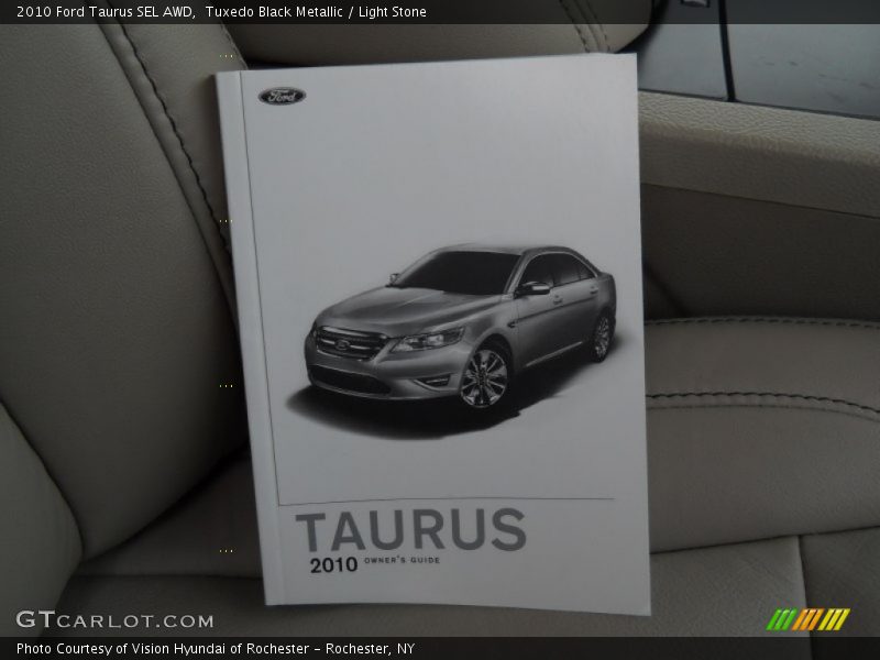 Tuxedo Black Metallic / Light Stone 2010 Ford Taurus SEL AWD