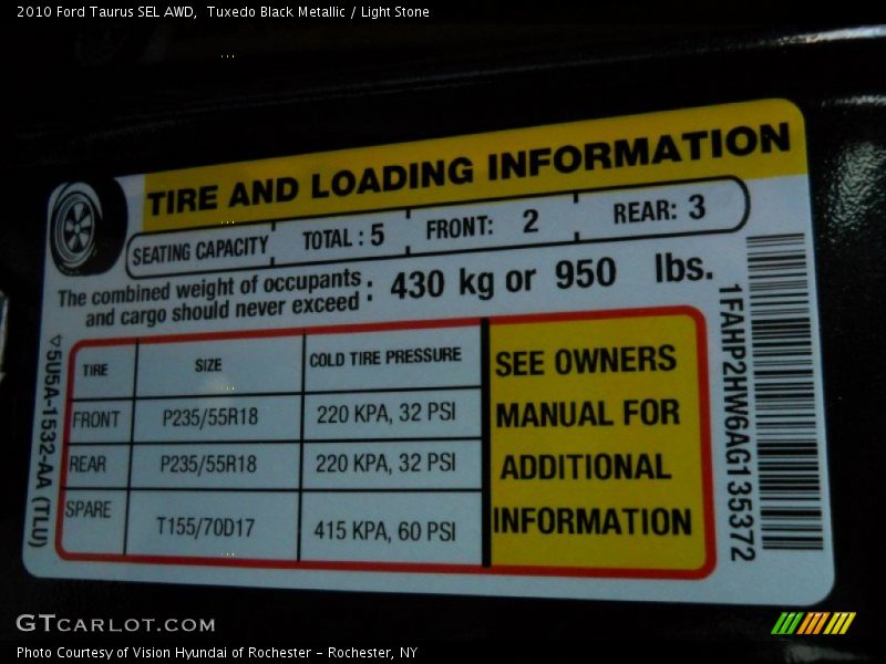 Tuxedo Black Metallic / Light Stone 2010 Ford Taurus SEL AWD