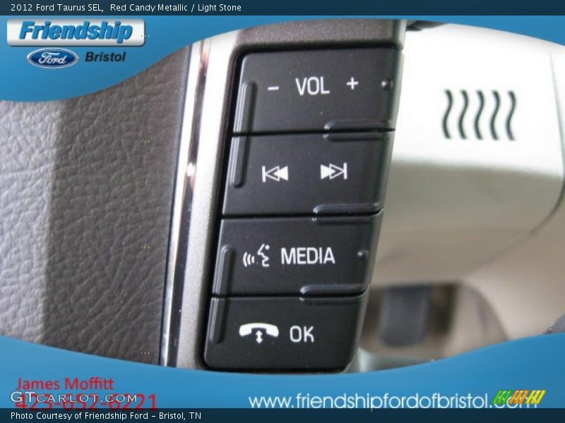 Red Candy Metallic / Light Stone 2012 Ford Taurus SEL