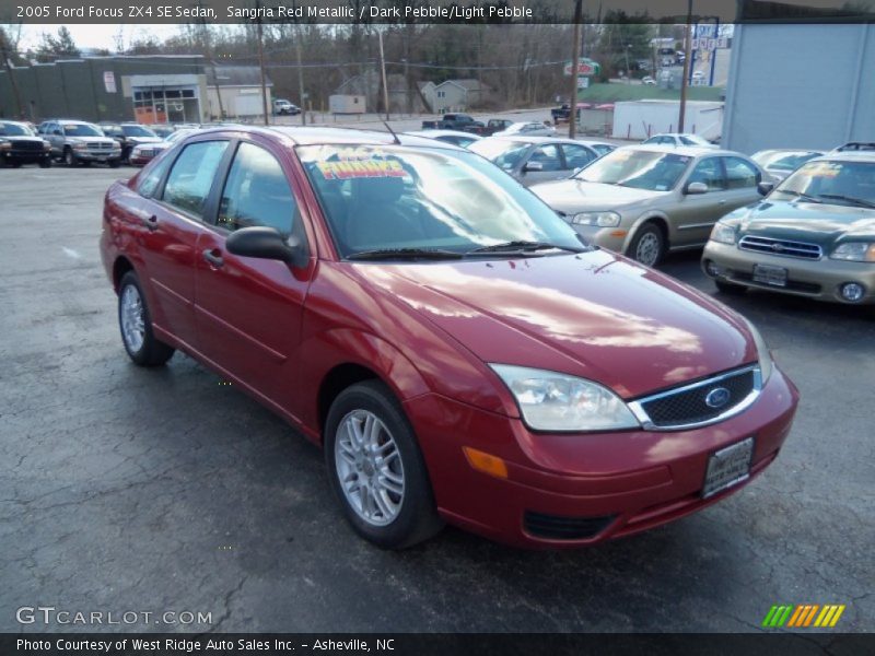 Sangria Red Metallic / Dark Pebble/Light Pebble 2005 Ford Focus ZX4 SE Sedan