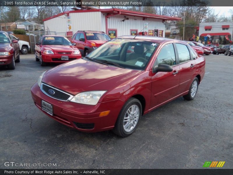 Sangria Red Metallic / Dark Pebble/Light Pebble 2005 Ford Focus ZX4 SE Sedan