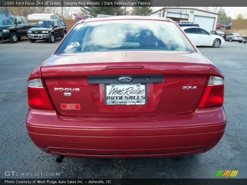 Sangria Red Metallic / Dark Pebble/Light Pebble 2005 Ford Focus ZX4 SE Sedan