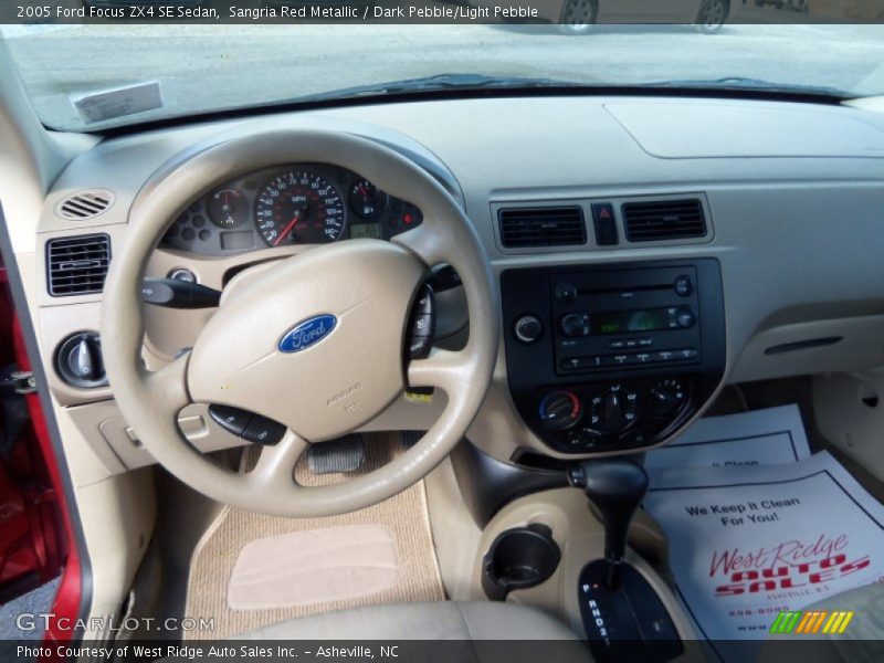 Sangria Red Metallic / Dark Pebble/Light Pebble 2005 Ford Focus ZX4 SE Sedan