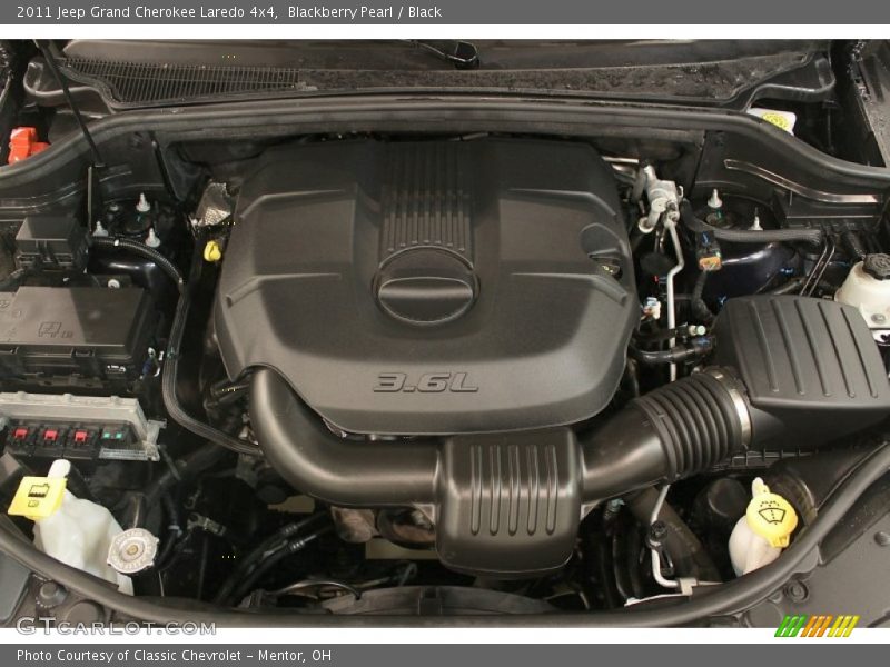 Blackberry Pearl / Black 2011 Jeep Grand Cherokee Laredo 4x4