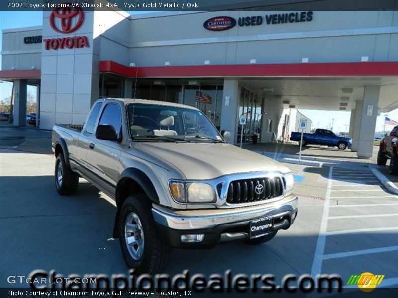 Mystic Gold Metallic / Oak 2002 Toyota Tacoma V6 Xtracab 4x4