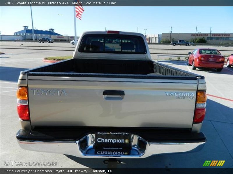 Mystic Gold Metallic / Oak 2002 Toyota Tacoma V6 Xtracab 4x4