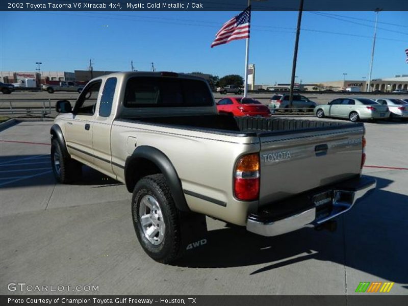 Mystic Gold Metallic / Oak 2002 Toyota Tacoma V6 Xtracab 4x4