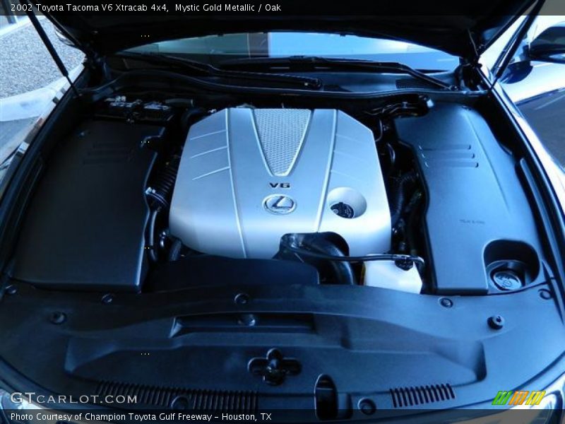 Mystic Gold Metallic / Oak 2002 Toyota Tacoma V6 Xtracab 4x4