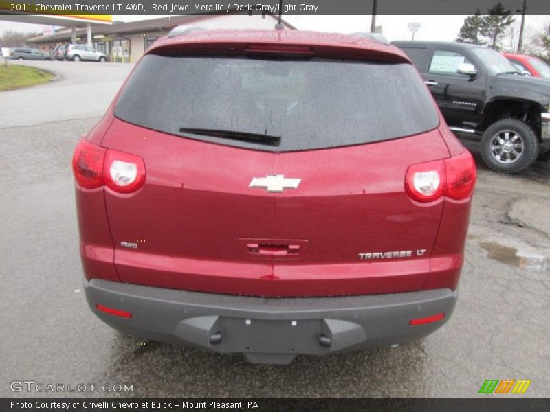 Red Jewel Metallic / Dark Gray/Light Gray 2011 Chevrolet Traverse LT AWD
