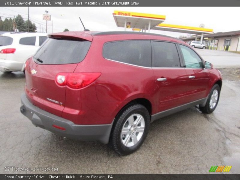 Red Jewel Metallic / Dark Gray/Light Gray 2011 Chevrolet Traverse LT AWD