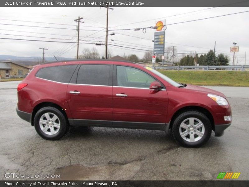 Red Jewel Metallic / Dark Gray/Light Gray 2011 Chevrolet Traverse LT AWD
