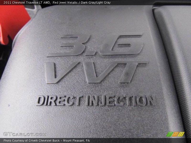 Red Jewel Metallic / Dark Gray/Light Gray 2011 Chevrolet Traverse LT AWD
