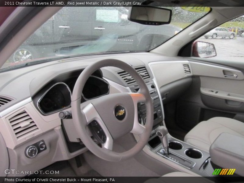 Red Jewel Metallic / Dark Gray/Light Gray 2011 Chevrolet Traverse LT AWD