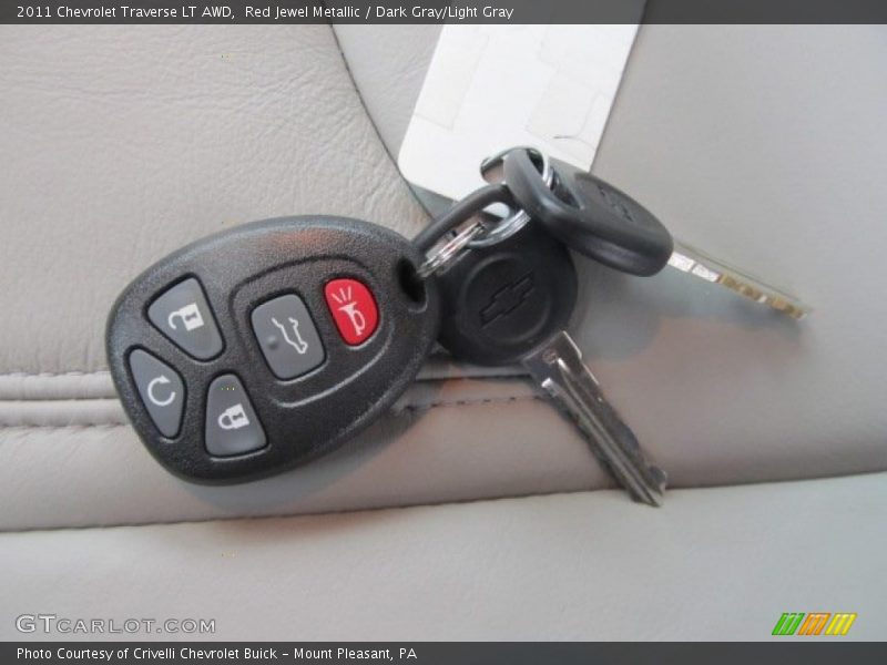 Red Jewel Metallic / Dark Gray/Light Gray 2011 Chevrolet Traverse LT AWD