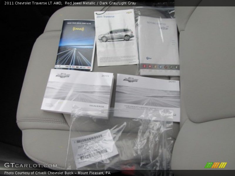 Red Jewel Metallic / Dark Gray/Light Gray 2011 Chevrolet Traverse LT AWD