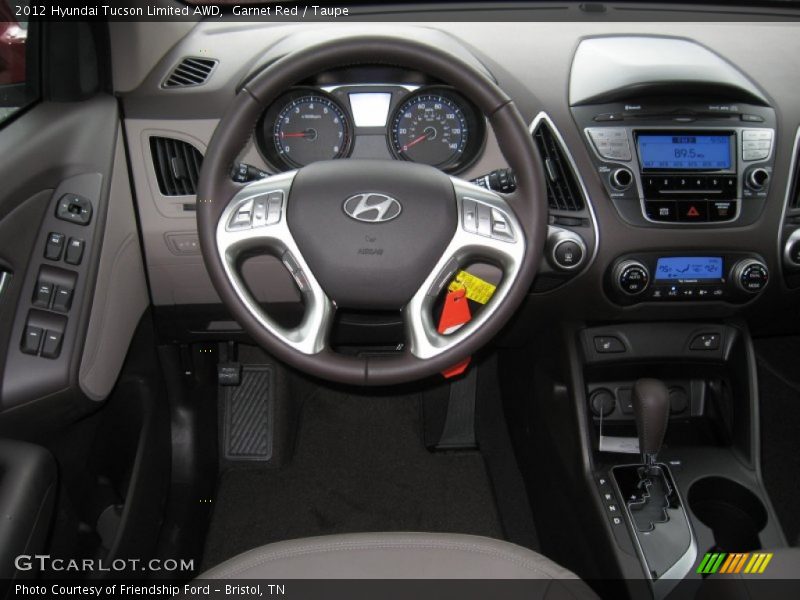 Garnet Red / Taupe 2012 Hyundai Tucson Limited AWD