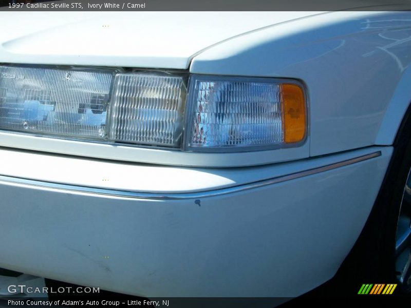 Ivory White / Camel 1997 Cadillac Seville STS