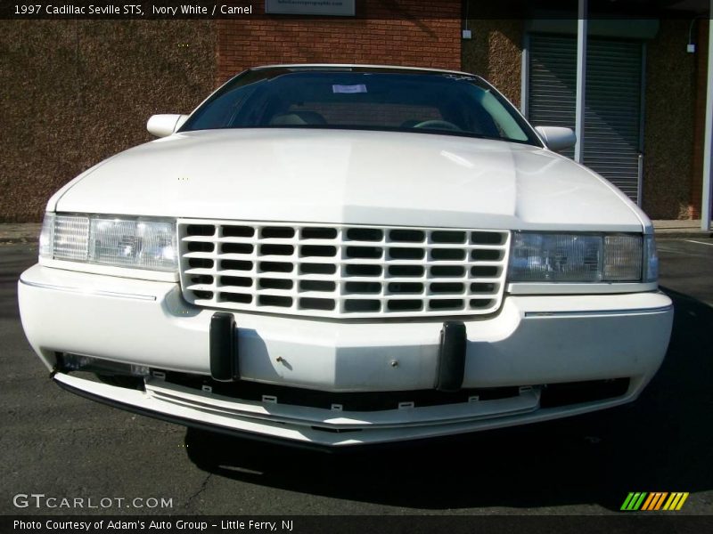 Ivory White / Camel 1997 Cadillac Seville STS
