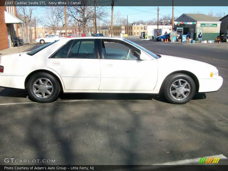 Ivory White / Camel 1997 Cadillac Seville STS