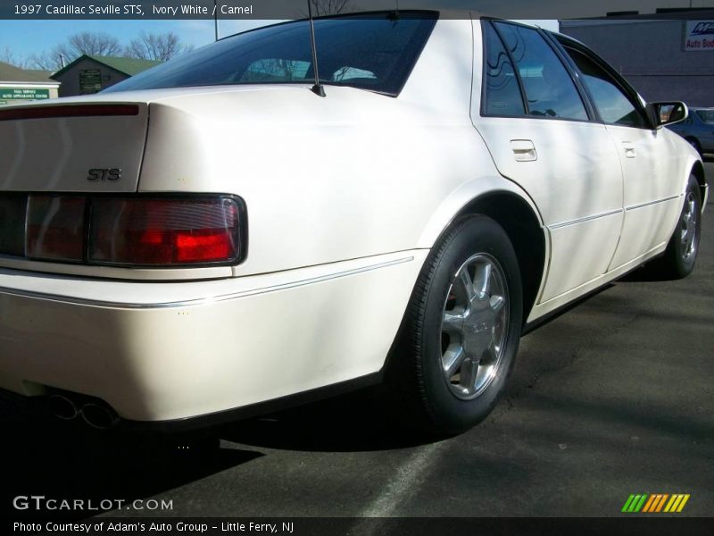 Ivory White / Camel 1997 Cadillac Seville STS