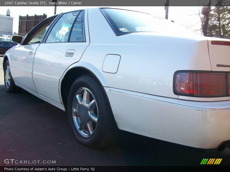 Ivory White / Camel 1997 Cadillac Seville STS