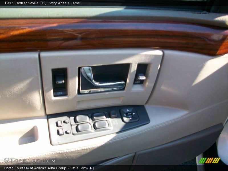 Ivory White / Camel 1997 Cadillac Seville STS