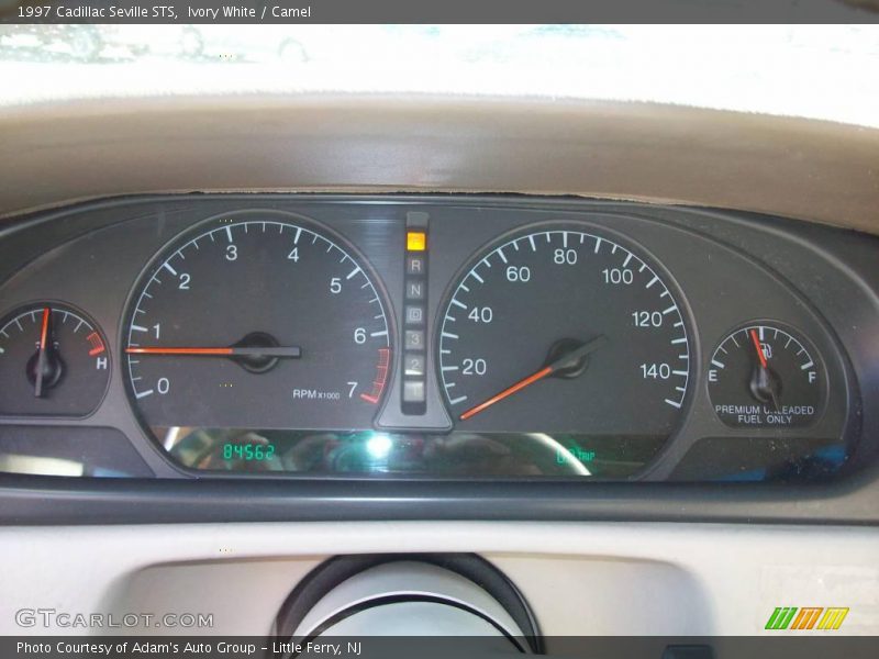 Ivory White / Camel 1997 Cadillac Seville STS