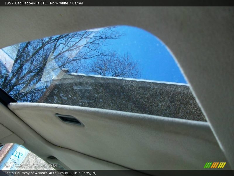 Ivory White / Camel 1997 Cadillac Seville STS