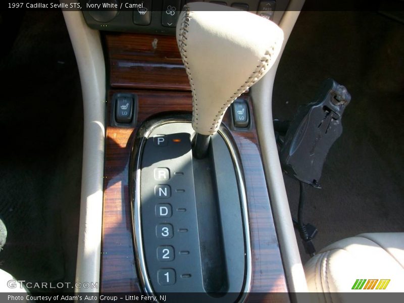 Ivory White / Camel 1997 Cadillac Seville STS