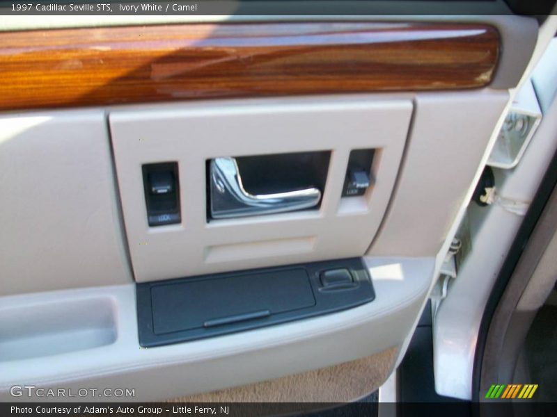 Ivory White / Camel 1997 Cadillac Seville STS