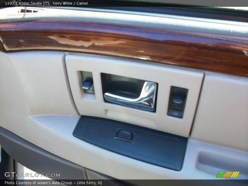 Ivory White / Camel 1997 Cadillac Seville STS