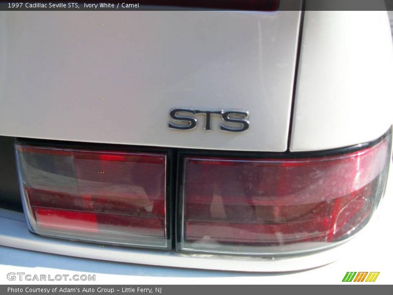 Ivory White / Camel 1997 Cadillac Seville STS
