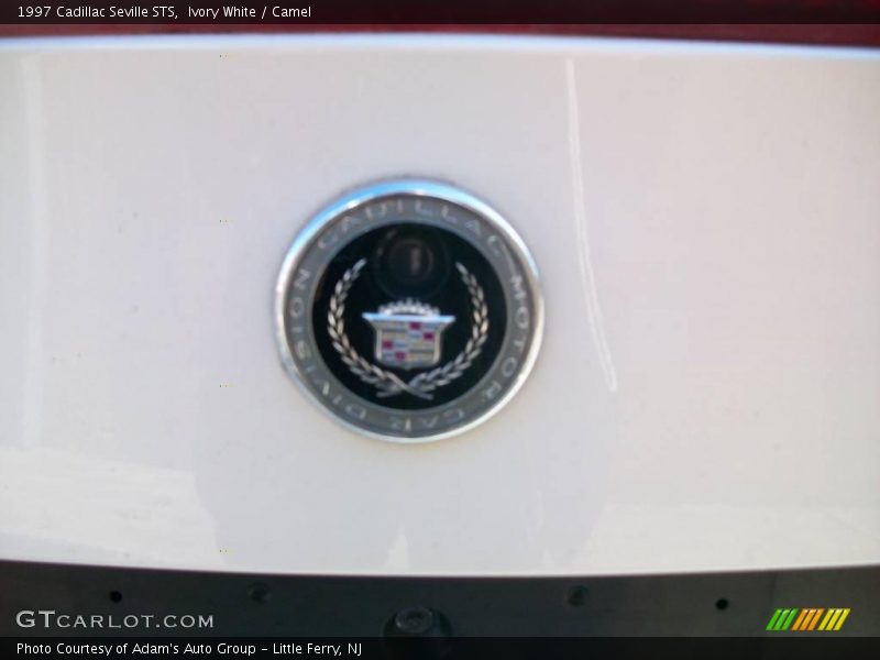 Ivory White / Camel 1997 Cadillac Seville STS