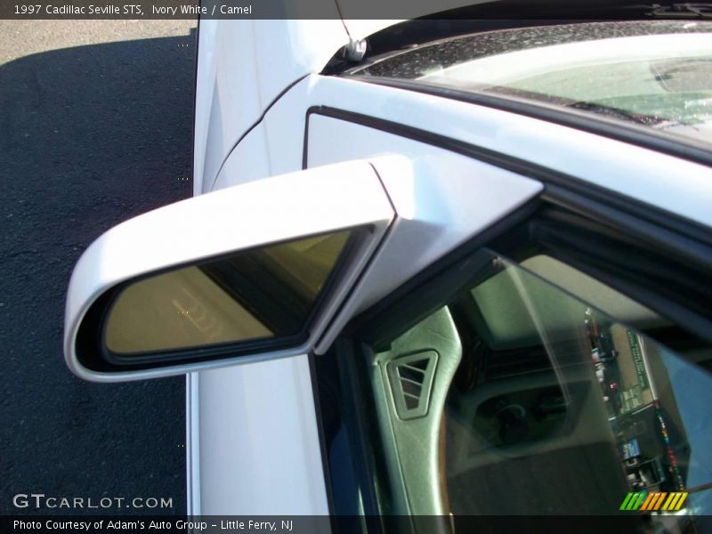 Ivory White / Camel 1997 Cadillac Seville STS