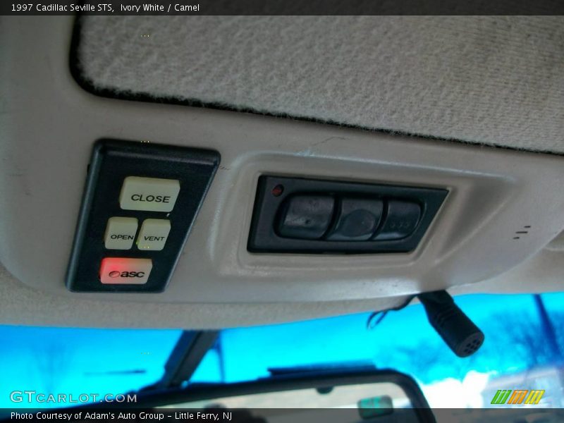 Ivory White / Camel 1997 Cadillac Seville STS
