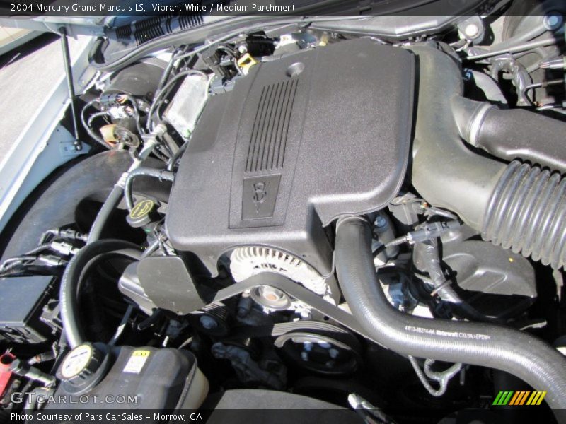 Vibrant White / Medium Parchment 2004 Mercury Grand Marquis LS