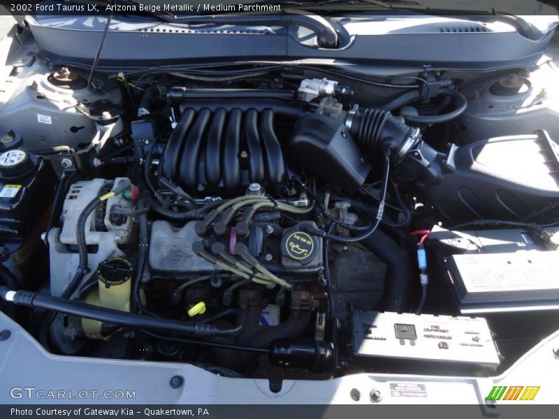 Arizona Beige Metallic / Medium Parchment 2002 Ford Taurus LX