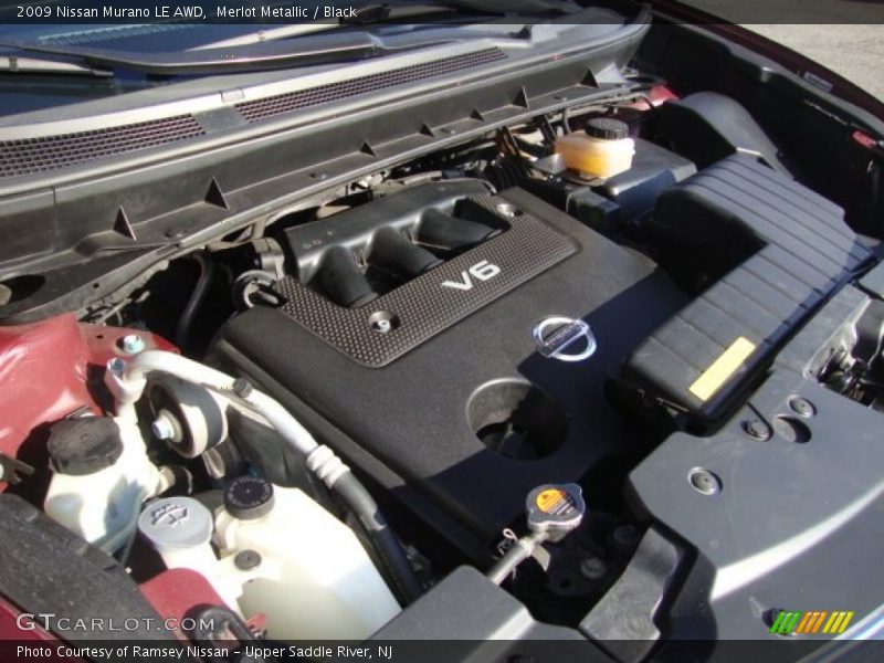 Merlot Metallic / Black 2009 Nissan Murano LE AWD