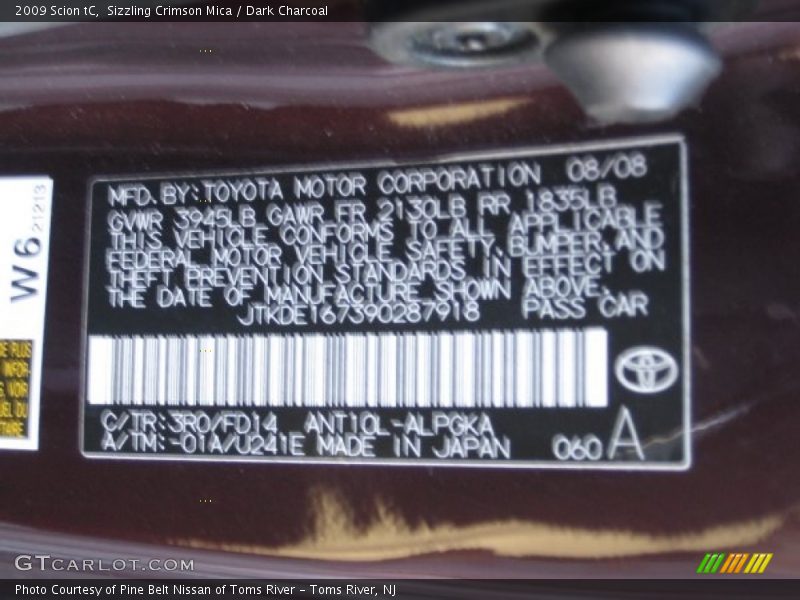 Sizzling Crimson Mica / Dark Charcoal 2009 Scion tC