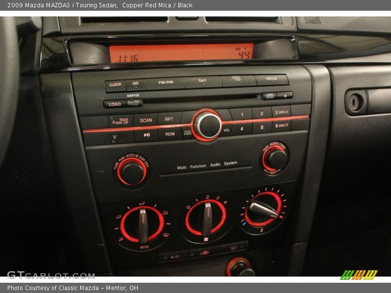 Copper Red Mica / Black 2009 Mazda MAZDA3 i Touring Sedan