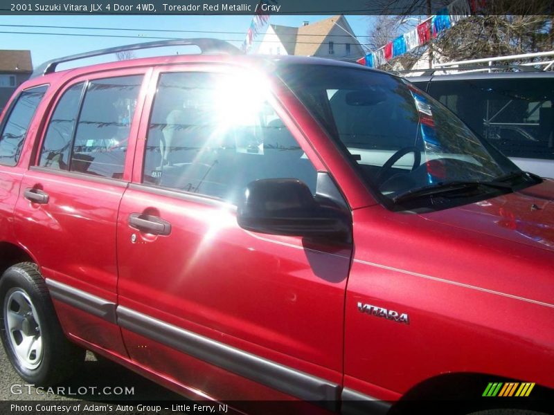 Toreador Red Metallic / Gray 2001 Suzuki Vitara JLX 4 Door 4WD