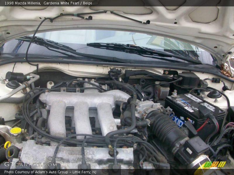 Gardenia White Pearl / Beige 1998 Mazda Millenia
