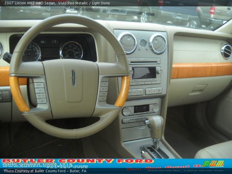 Vivid Red Metallic / Light Stone 2007 Lincoln MKZ AWD Sedan