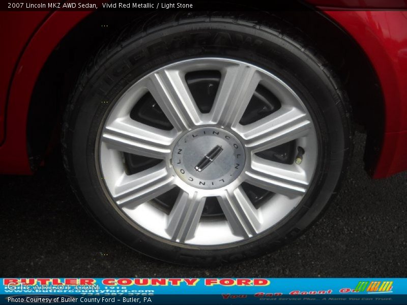 Vivid Red Metallic / Light Stone 2007 Lincoln MKZ AWD Sedan