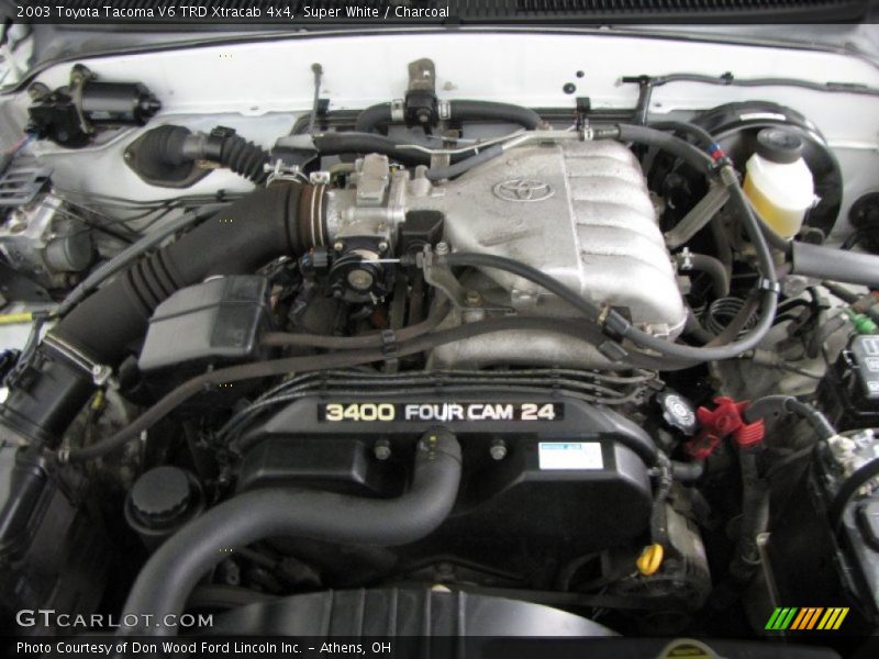 Super White / Charcoal 2003 Toyota Tacoma V6 TRD Xtracab 4x4