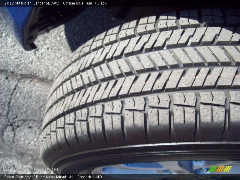 Octane Blue Pearl / Black 2012 Mitsubishi Lancer SE AWD